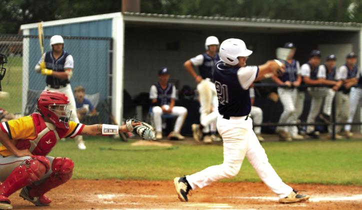 Asher senior Beau Willis swings for the ball before getting to walk, as Dale senior Wyatt Seeley reaches for the catch, during the Asher Baseball Festival at Asher on Sept. 5. Natasha Dunagan, Countywide &amp;amp; Sun
