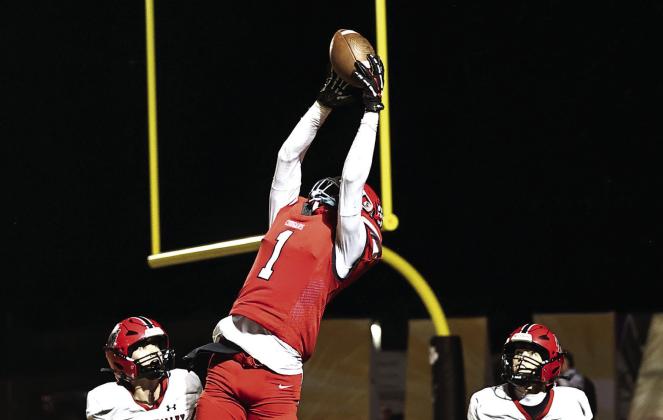 NRC's Memphis Burdine goes up high for his 2nd TD of the night. North Rock Creek lost to Pauls Valley, 21-23. Photo Courtesy of Gowin Photography