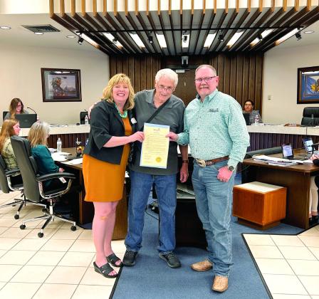 Mayor Bolt proclaimed May 19 through May 25 National Travel and Tourism Week. Shawnee’s Director of Tourism, Stacy Cramer Moore (left) and Derek Barton pose with Bolt. Countywide &amp;amp; Sun/Suzie Campbell