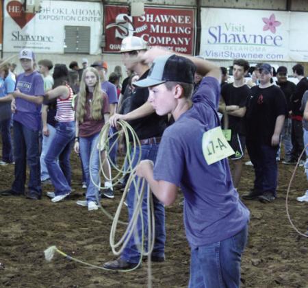 Tripp Motley, of Bethel FFA, competes in dummy steer roping during the Farmhand Olympics on Sept. 3 at the Pottawatomie County Free Fair.