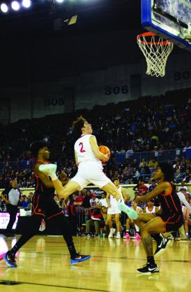 David King jumps for two on Mar. 8 in the Semifinals at the State Fair Arena. North Rock Creek took the loss 38-74 and Douglass went on to win the 4A Championship title. Countywide &amp;amp; Sun/Julie Talton