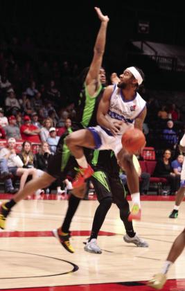 Potawatomi Fire shooting guard Jaylen Mahone aims for the basket in the home game with the Little Rock Lightning on April 19. The Fire won, 125-105, making their record 11-0. Countywide &amp; Sun/Natasha Dunagan