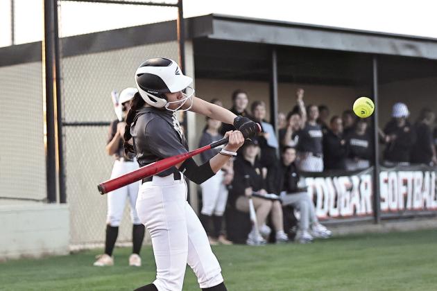 Serenity Jacoway prepares for a hit at bat. Photo courtesy of Gowin Photography