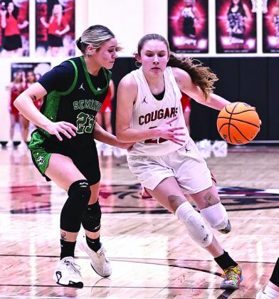 North Rock Creek's Kadence Munn drive to basket in the District Tournament game Saturday, Feb. 22. The Lady Ccougars beat Seminole 68-33. It is the first time the Lady Cougars have won the District Championship.