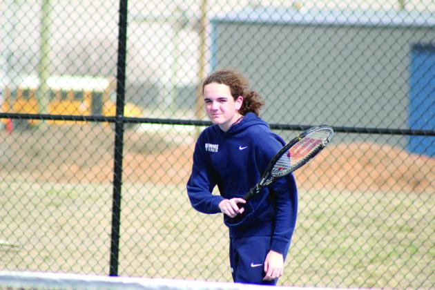 Shawnee freshman Sammy Thomas keeps his eye on the ball after returning it during the Shawnee Invitational on March 14. Thomas is on the extra #2 Doubles team with Brandon Holter. Natasha Dunagan, Countywide &amp; Sun