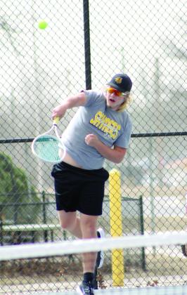 Tecumseh's Ted Belshe serves during the Shawnee Invitational during #1 Doubles action against Shawnee on March 14. Natasha Dunagan, Countywide &amp; Sun
