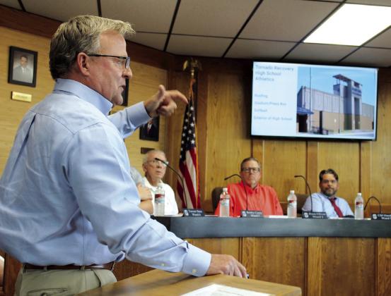 Shawnee Public Schools Executive Director of Operations Ron Stearns gives a presentation on the progress of tornado recovery projects to the Shawnee Board of Education on Aug. 5. He said they will have the new digital scoreboard installed at Jim Thorpe Stadium on Aug. 22, and they will have as much done on the stadium as possible before the first football game on Sept. 13. The press box may not be done by then, but there will be a rendering of it on display. Countywide &amp; Sun/ Natasha Dunagan