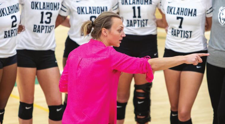 Oklahoma Baptist University Volleyball coach Anna Howle goes over the game plan with players. Photo provided