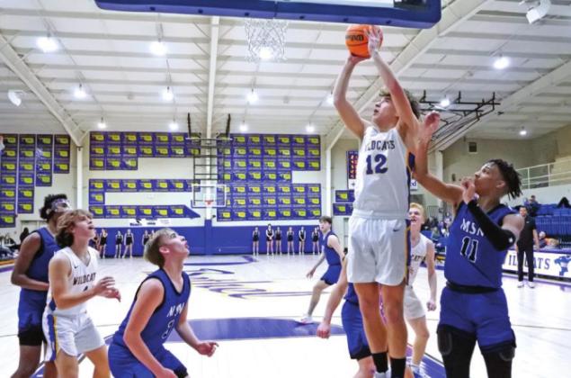 Bethel’s John Gordon aims for the basket during the home game against Mount St. Mary on Jan. 28. The Bethel Wildcats lost 39-51. Countywide &amp;amp; Sun/Suzie Campbell