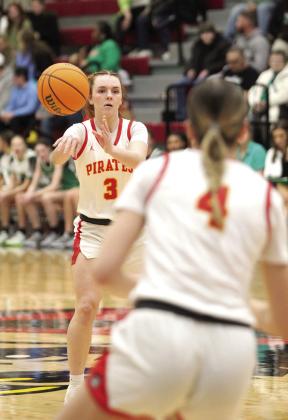 Dale junior Skylar Anderson passes the ball to senior Ava Bell.