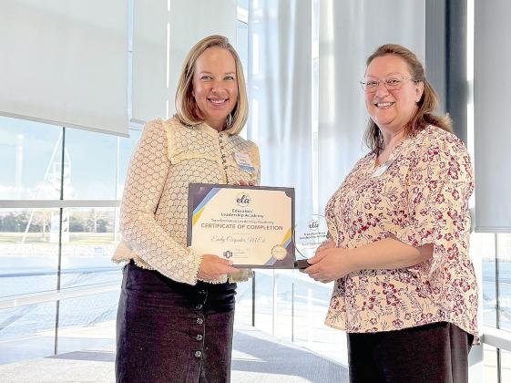 Seminole State College STEM Division Chair Emily Carpenter (left) recently completed the University of Central Oklahoma’s Educator’s Leadership Academy. Dr. Elizabeth Albright (right), Chair of the School of Education and Behavioral Sciences at Langston University and ELA Advisor, presented Carpenter with a certificate of completion. Photo provided by SSC