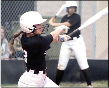 Tecumseh’s Taylor Gage hits a double in the second inning of the second home game on April 4.