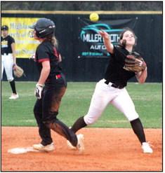 Tecumseh second baseman Katie Overstreet throws to first during the Lady Savages’ second home game of the evening, April 4. They won that game against Westmoore, 15-5, and beat Latta, 6-4. Countywide &amp;amp; Sun/Natasha Dunagan