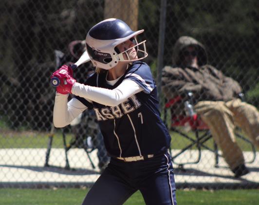 Asher freshman Mackenzie Thompson keeps her eye on the ball while at bat during the RWB Tournament game against Roff at Asher on March 26. The Lady Indians beat Roff, 4-2; Konawa, 19-5; and Wayne, 11-7, all in one day, to win the tournament. Countywide &amp; Sun/Natasha Dunagan
