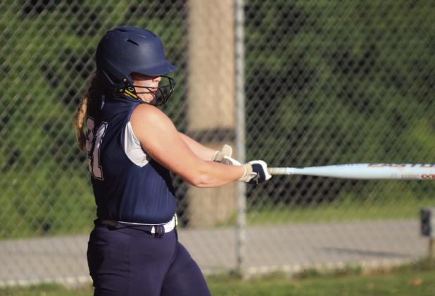 Asher sophomore Josey Milburn hits a triple and drives in two runs.
