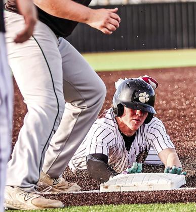 NRC's Hunter Bertram steals 3rd base in the Mar. 9 game against Seminole. NRC won both games of the double header, 14-0. Photos Courtesy of Gowin Photography