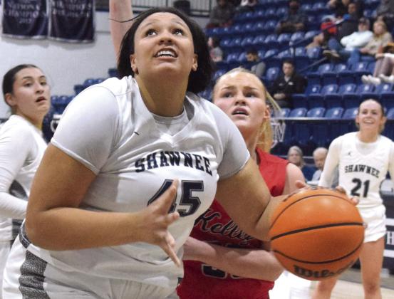 Karma Mason finds the basket in the homecoming game against Bishop Kelley.  The Lady Wolves pulled out the victory 54-33.  Countywide &amp; Sun/Julie Talton