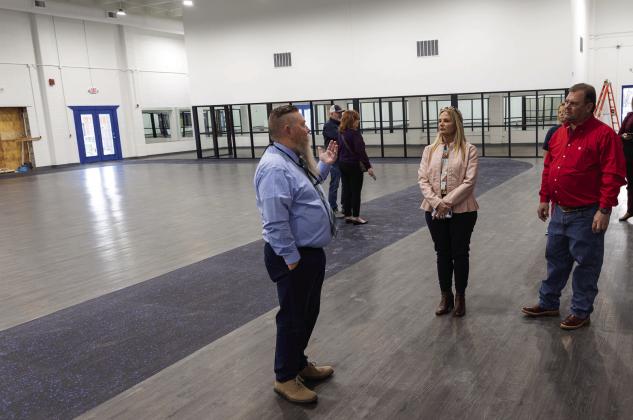 Following the Seminole State College Board of Regents Meeting on Feb. 15, regents and college employees toured the wellness center to see the progress on its construction. Pictured (left to right): Vice President for Student Affairs Dr. Bill Knowles, Regent Robyn Ready and Regent Curtis Morgan.