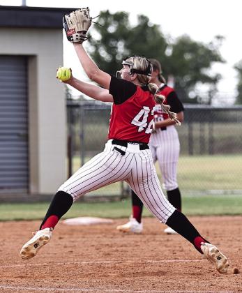 NRC Freshman, Madison Benson, pitches in the game against Berryhill. They were behind going into the bottom of the seventh inning but ended the game with a 6-5 win.