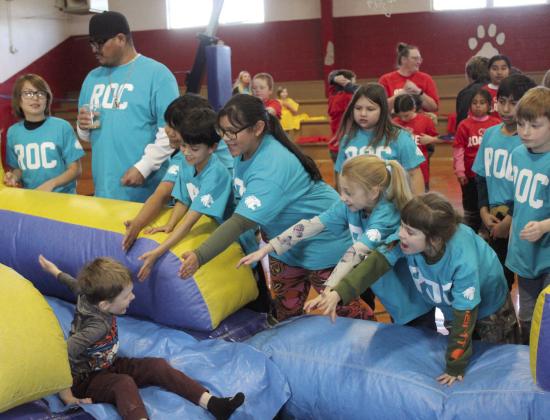 Members of the “ROC family” welcome Lane Whitlock during the Earlsboro Elementary School “Sorting Ceremony” on Jan. 17.