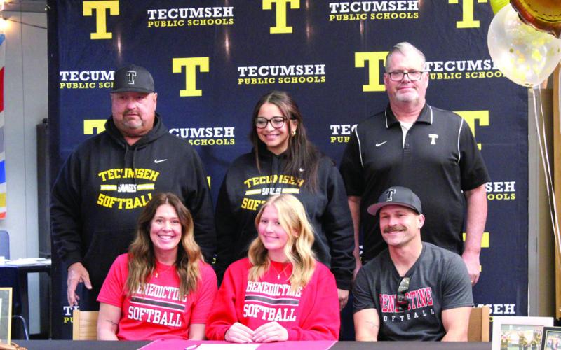 On Feb. 20, Tecumseh senior Steeli Mitchell signed a letter of intent to play softball with Benedictine College in Kansas. Shown, seated, are mother Destiny Mitchell, Mitchell, father Curtis MItchell, standing, softball coaches Perry Wilson, Aspen Grimes and Chad Trahan. Natasha Dunagan, Countywide &amp;amp; Sun
