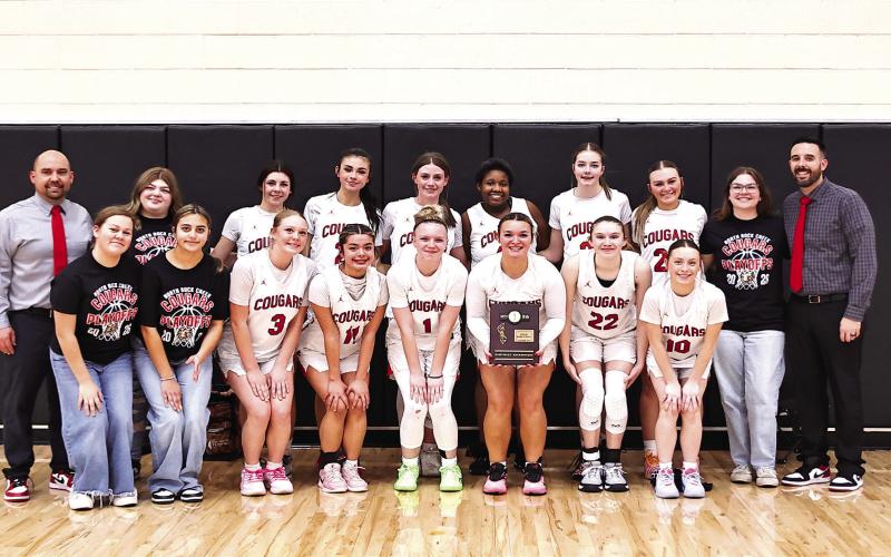 The North Rock Creek Lady Cougars are 4A District Champions after beating Seminole, 54-27, in the game on Feb. 21. After losing to Mannford, 59-69, on the 24th, they will continue to the consolation bracket on the 27th. They will need to win on the 27th and 28th to advance to Area. Photos Courtesy of Gowin Photography