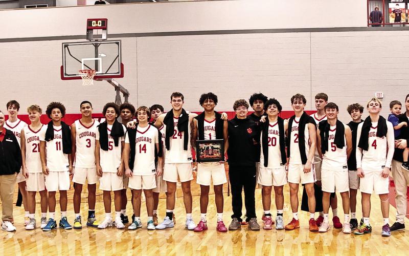 NRC's boys basketball team traveled to the Washington Tournament on Feb. 9. The finals were scheduled for Jan. 22nd, but was postponed due to snow storms. They took on Broken Bow, beating them 65-54. NRC won the tournament for the fourth year in a row. Photos Courtesy of Gowin Photography