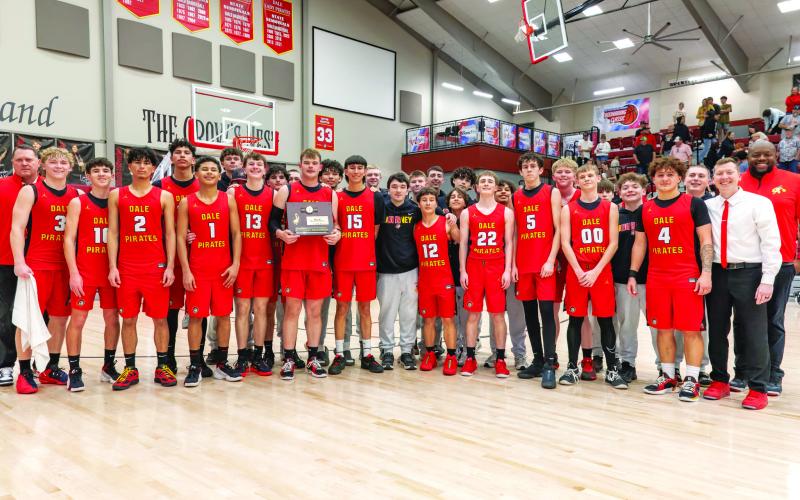 The Dale Pirates continue their march to the big house with a decisive 77-30 win over the Okemah Panthers. Dale moves on to the Area tournament this week. Photo courtesy of Rick Hester, Lincoln County News