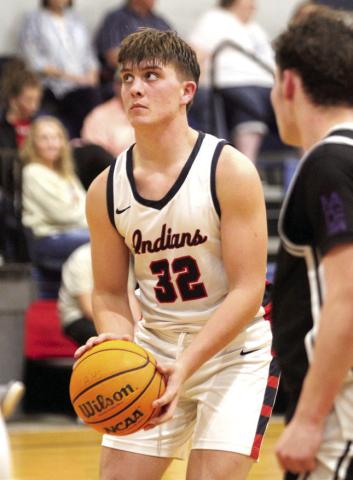 Asher's Mitchell Skender shoots a foul shot in the fourth quarter of the Feb. 13 District home game against the Oklahoma School for the Deaf.