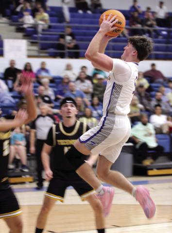 Bethel senior Zack Jennings aims and shoots in the first quarter on Feb. 6.