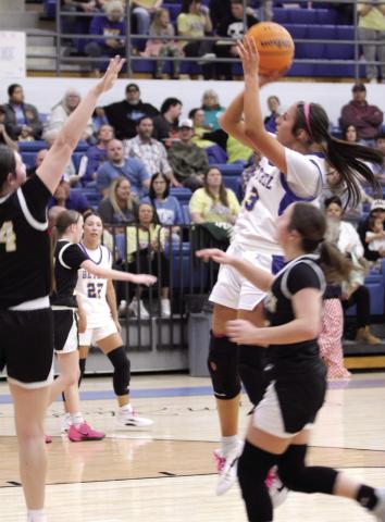 Bethel senior Alexis Tucker aims for the hoop during the first quarter of the Feb. 6 homecoming game against Tecumseh. The Lady Wildcats won 49-28.
