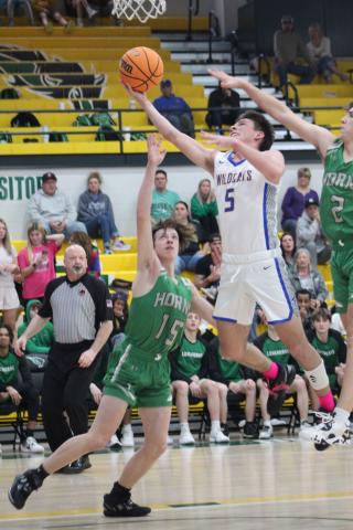 Bethel senior Garren Sheppard goes up for the shot and draws a foul in the first quarter of the Jones game on Feb. 13. The Wildcats won by one point, 56-55. On Feb. 17, they beat Okmulgee to win Districts, 65-63. Today (Feb. 23) they will play at Prague in Regionals at 7:30. Countywide &amp; Sun/Natasha Dunagan