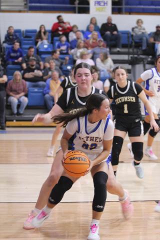 Bethel senior Ava Gascon looks for an opening to pass during the Feb. 6 homecoming game against Tecumseh. Gascon reached her 1,000th point during the Cashion Tournament on Jan. 21. Natasha Dunagan, Countywide &amp; Sun