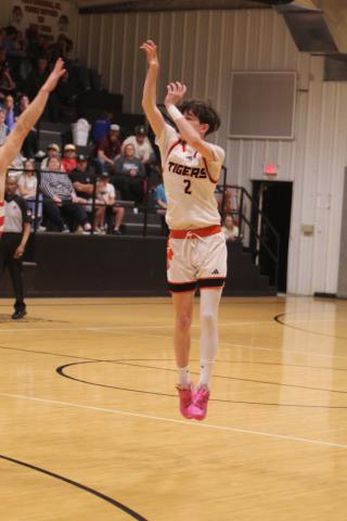 Maud senior Colt Abbott tries for three points during the Class B2 Regional Tournament, held at Maud on Feb. 17. The Indians won this game, 66-35, as well as the second round against Mill Creek, and advance to the Area Tournament. The Tigers won against New Lima and Bowlegs in the Consolation Round and also advance to Area at the Mvskoke Dome today (Feb. 26).