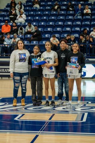 Tarilyn Thierry poses with her family during the Shawnee High School Basketball Senior Night Ceremony, which was held between the girls and boys games on Feb. 13. Other seniors who were recognized were Aidon Siqueiros, Daley Rice, Aanyiah Lambert, Ja'Qwon Evans, Jocelyn Hayes and Aniya Kowena. Photo courtesy of SPS