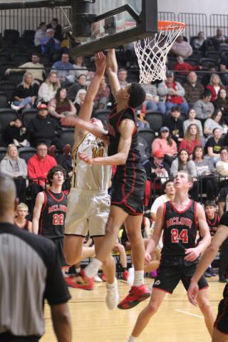 Tecumseh junior Cashawn Thompson tries for two points in the second quarter of the Feb. 3 home game against McLoud. The Savages won 70-64 in overtime.