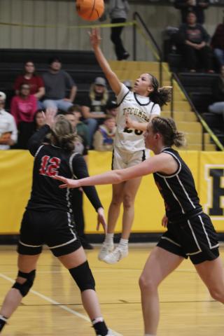 Tecumseh junior Anniah Phillips puts up a shot during the third quarter of the Feb. 3 home game with McLoud. The Lady Savages lost 20-83.