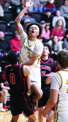 Tecumseh senior Jekhi Owens takes his shot during the Feb. 3 home game against McLoud.