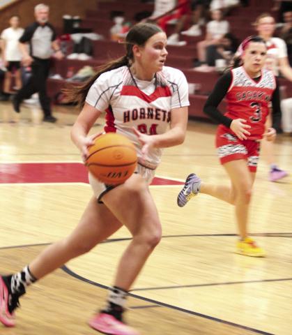 Macomb senior Cassi Johnson goes to the hoop during the Feb. 10 senior night game against Sasakwa. The Lady Hornets lost 55-- 78. Their next game will be in the Consolation Round of Regional play at Roff on Feb. 19 at 6 pm. The Hornets will also be in the Consolation Round of Regionals, playing Kiowa at Roff at 7:30 pm.