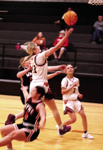 Maud junior Aubri Kueneman aims for the bucket in the fourth quarter of the Feb. 5 home game against Wayne. The Lady Tigers lost 25-68.