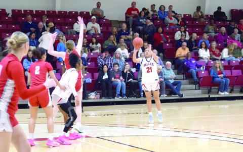 SSC Belle Tylyn Thurman (formerly a SHS Lady Wolf) sinks a trey at the Feb. 16 home game. Julie Talton, Countywide &amp;amp; Sun