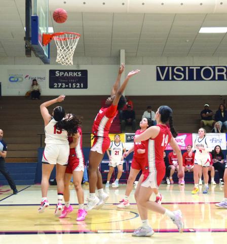 SSC Belle Nazhoni Sleeper scores two around the Northern Maverick defenders. Julie Talton, Countywide &amp;amp; Sun