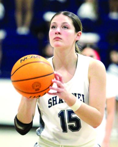 Shawnee junior Taylor Bailey lines up her foul shot during the Feb. 13 District game. Natasha Dunagan, Countywide &amp; Sun