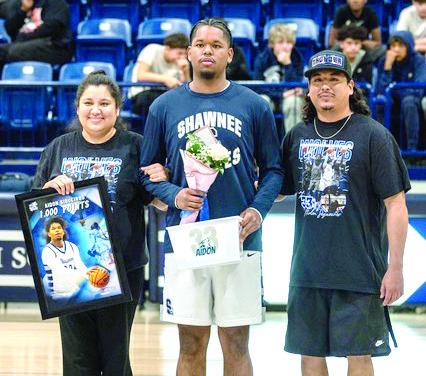 Aidon Siqueiros is pictured with family during Senior Night for Shawnee High School basketball on Feb. 13, as the Wolves hosted Tulsa’s Booker T. Washington. While both the Lady Wolves and Wolves came up short on the scoreboard, the evening centered on celebrating the dedication, leadership, and lasting impact of Shawnee’s senior athletes and managers. Other seniors honored were: Aniya Kowena, Daley Rice, Tarilyn Thierry, Jocelyn Hayes, Aaniyah Lambert, and Ja’Qwon Evans. Photo Provided by SPS