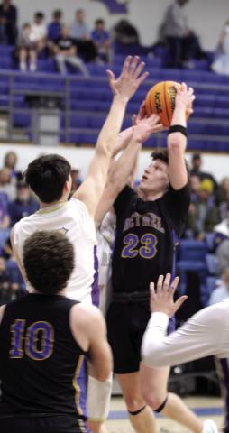 Bethel senior Darius Cheatham aims for the basket.
