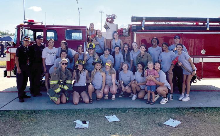 Tecumseh High School Cheerleaders pose with Tecumseh Firefighters during the 2nd Annual Car Show. See more photos on page A3. Countywide &amp; Sun/Adriana Fincher