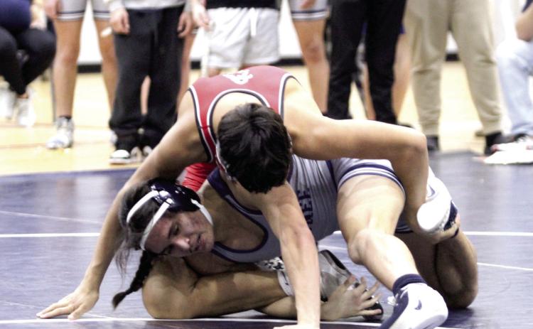 Shawnee's Jaxon Shawnee tries to escape a take-down during the home dual against Del City on Jan. 8. Natasha Dunagan, Countywide &amp; Sun