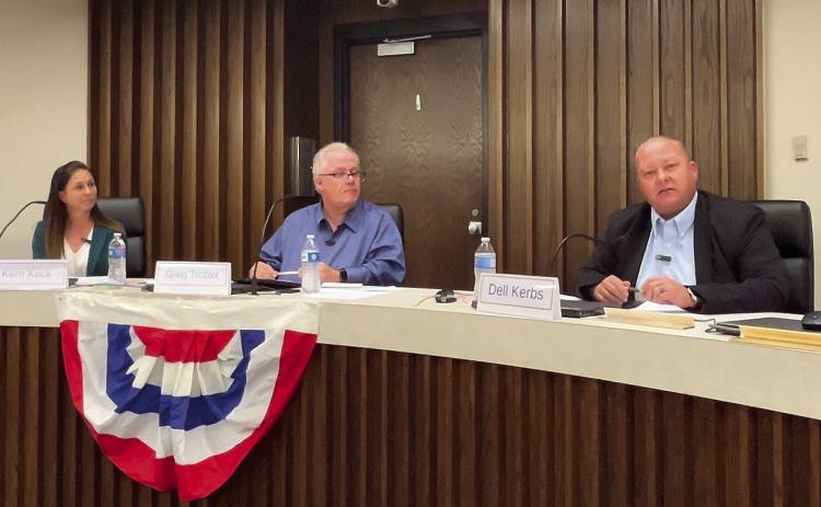 Rep. Dell Kerbs (right) addresses the audience during the forum held by the Pottawatomie Advocates for Voter Education (PAVE). Candidate Kerri Kerbs (le_) and PAVE moderator Greg Trotter (center) listen intently. Countywide &amp; Sun/Suzie Campbell