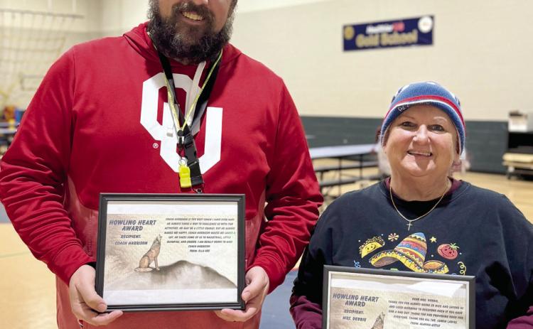 Tyler Harrison and Mrs. Debbie show off their Howl Heart Awards. Photo provided by SPS