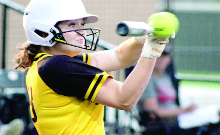 Tecumseh sophomore Josie Walker sees eye to eye with the ball before sending it flying during the game against Shattuck in the Dale Slow Pitch Festival at FireLake Ball Fields on April 17. Over the two-day tournament, the Lady Savages sank Shattuck, 20-9; pushed past Pryor, 6-4; canceled Cache, 8-3; and fell to Silo, 8-13. Natasha Dunagan, Countywide & Sun